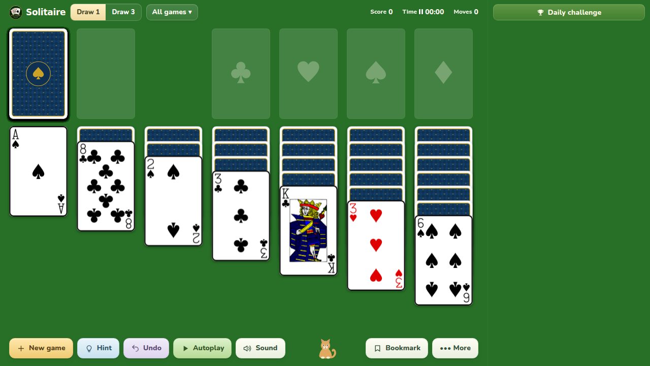 Klondike game with seven tableau columns, covered cards, stock and foundation spaces